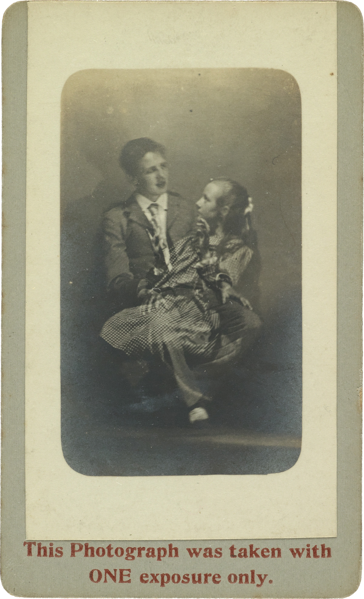 (CREWE CIRCLE--WILLIAM HOPE & WILLIAM WALKER) A pair of spirit photographs, each showing the ghost of Margery Walker and her brother.